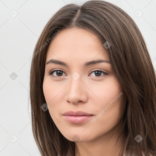 Neutral white young-adult female with long  brown hair and brown eyes