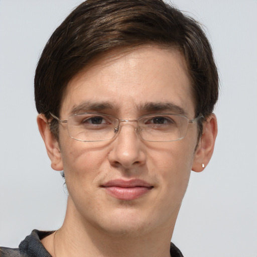 Joyful white adult male with short  brown hair and grey eyes