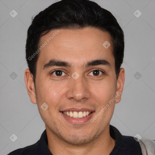 Joyful white young-adult male with short  black hair and brown eyes