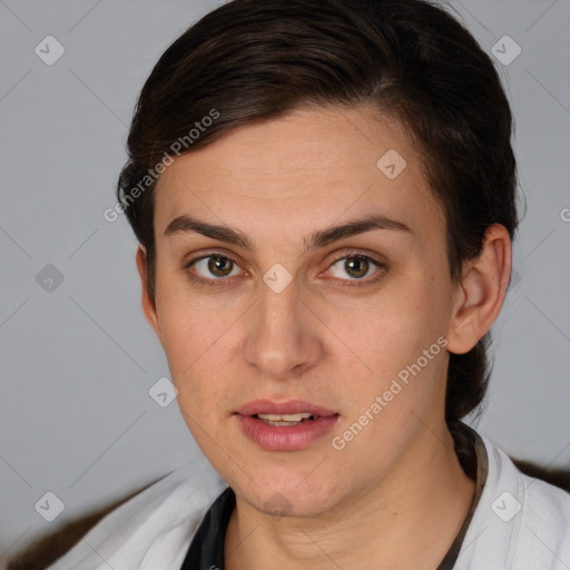 Joyful white young-adult female with short  brown hair and brown eyes