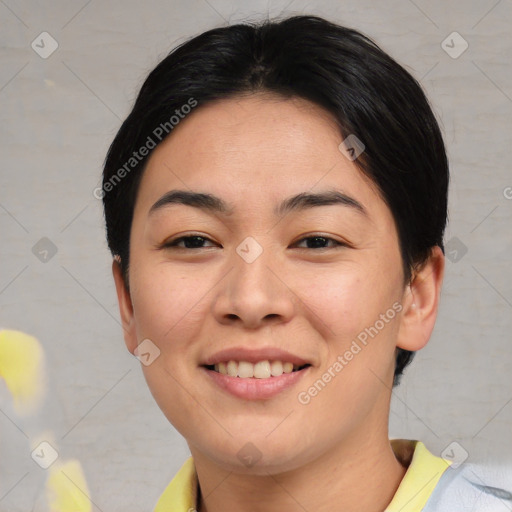 Joyful asian young-adult female with short  black hair and brown eyes