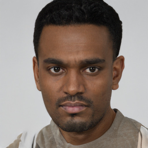 Neutral black young-adult male with short  black hair and brown eyes