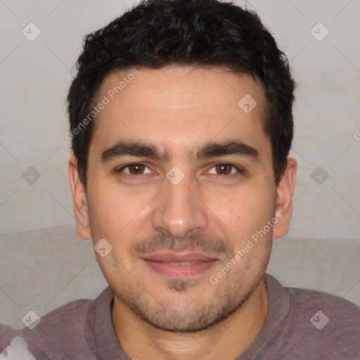 Joyful white young-adult male with short  black hair and brown eyes