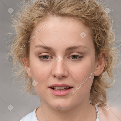 Joyful white young-adult female with medium  brown hair and blue eyes