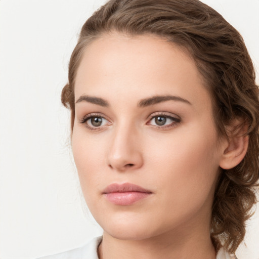 Neutral white young-adult female with medium  brown hair and brown eyes