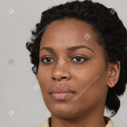 Neutral black young-adult female with short  black hair and brown eyes