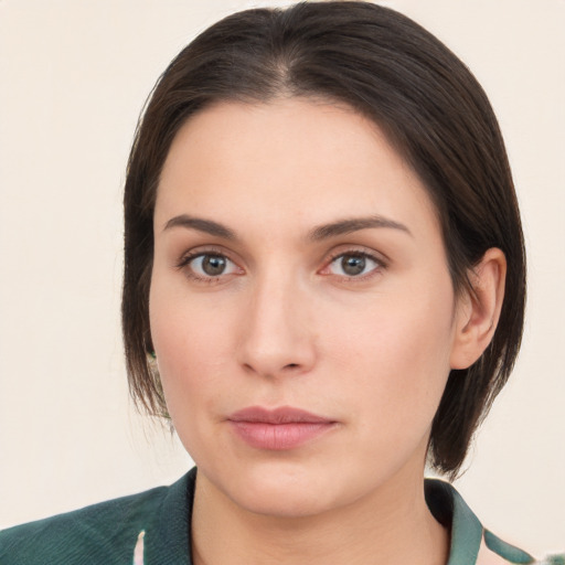 Neutral white young-adult female with medium  brown hair and brown eyes