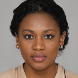 Neutral black young-adult female with short  brown hair and brown eyes