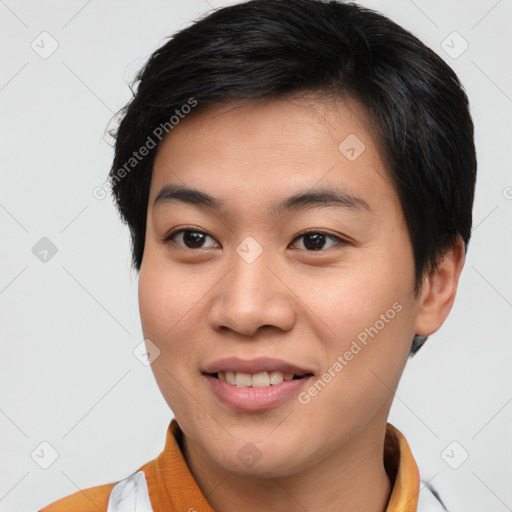 Joyful asian young-adult male with short  brown hair and brown eyes