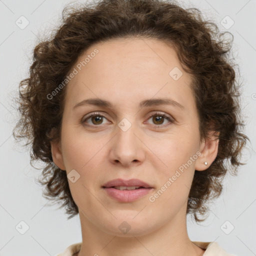 Joyful white young-adult female with medium  brown hair and green eyes