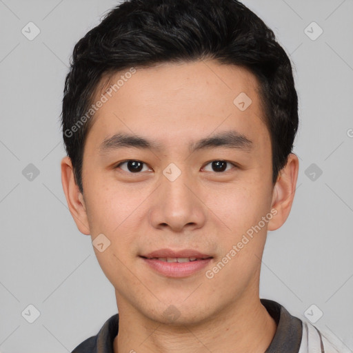 Joyful white young-adult male with short  black hair and brown eyes