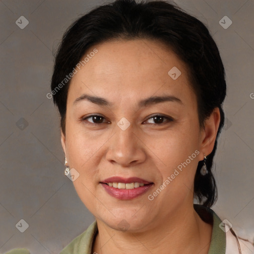 Joyful white adult female with medium  brown hair and brown eyes