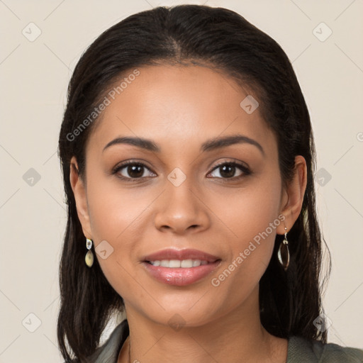 Joyful latino young-adult female with long  brown hair and brown eyes