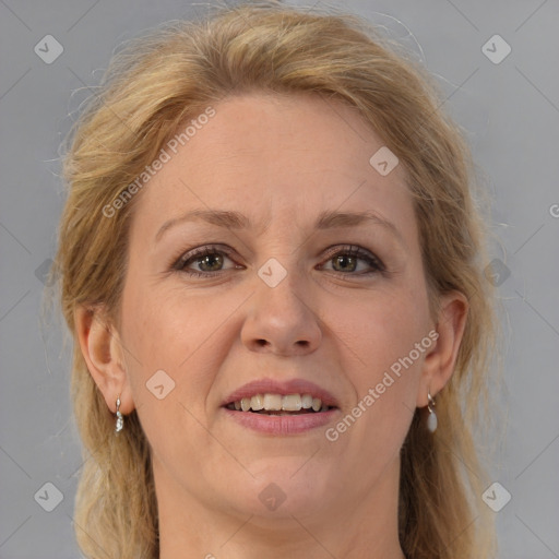 Joyful white adult female with medium  brown hair and brown eyes