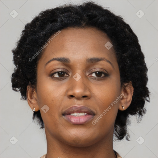 Joyful black young-adult female with medium  black hair and brown eyes