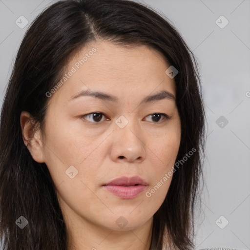 Neutral white young-adult female with long  brown hair and brown eyes