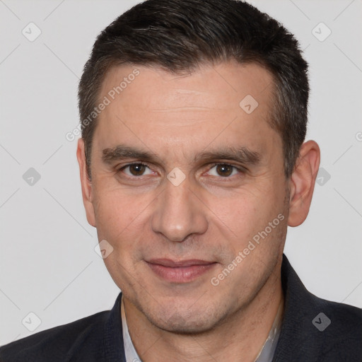 Joyful white adult male with short  brown hair and brown eyes