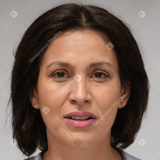 Joyful white adult female with medium  brown hair and brown eyes