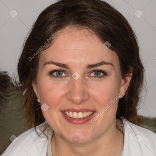 Joyful white young-adult female with medium  brown hair and blue eyes