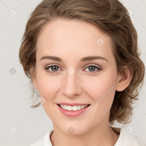 Joyful white young-adult female with medium  brown hair and green eyes