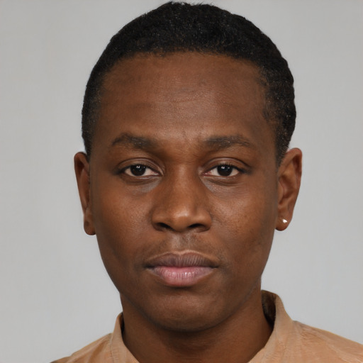 Neutral black young-adult male with short  brown hair and brown eyes