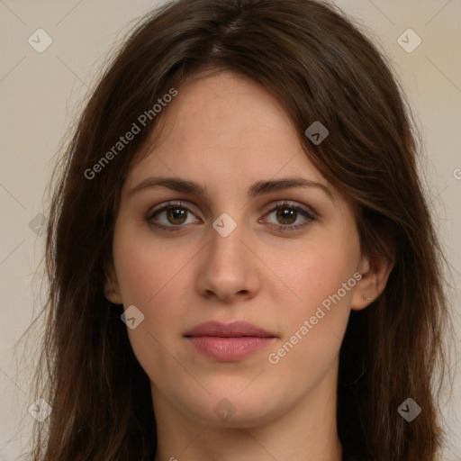 Joyful white young-adult female with long  brown hair and green eyes