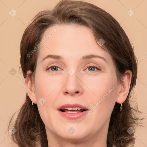 Joyful white young-adult female with medium  brown hair and green eyes