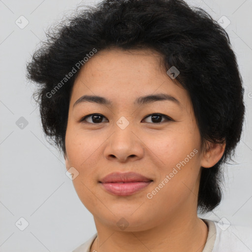 Joyful asian young-adult female with short  brown hair and brown eyes