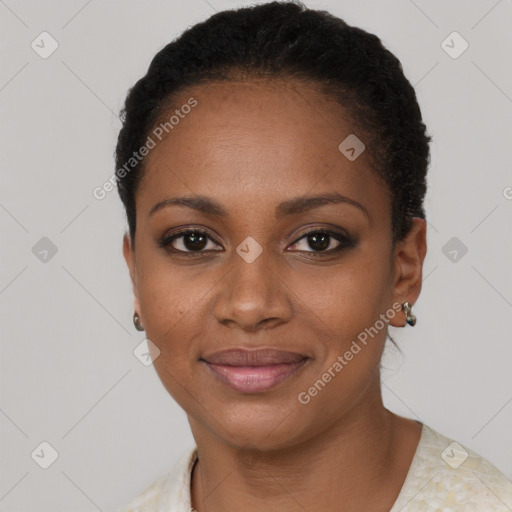 Joyful black young-adult female with short  black hair and brown eyes