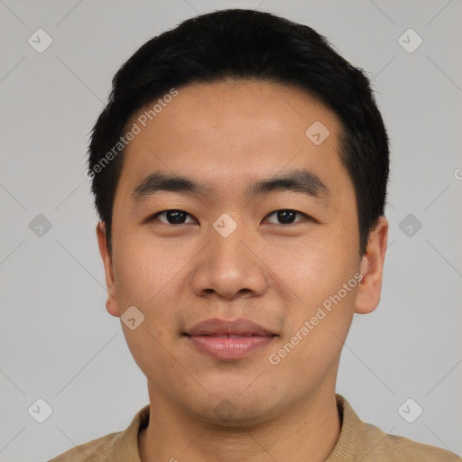 Joyful asian young-adult male with short  black hair and brown eyes