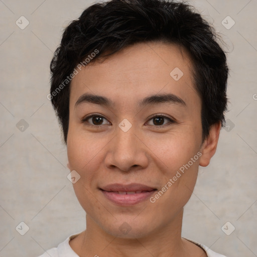 Joyful asian young-adult female with short  brown hair and brown eyes