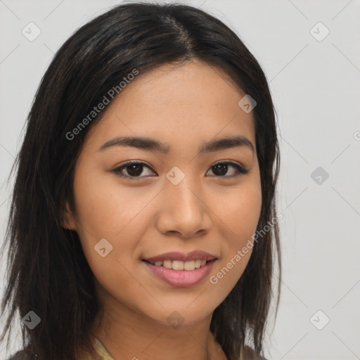 Joyful latino young-adult female with long  brown hair and brown eyes