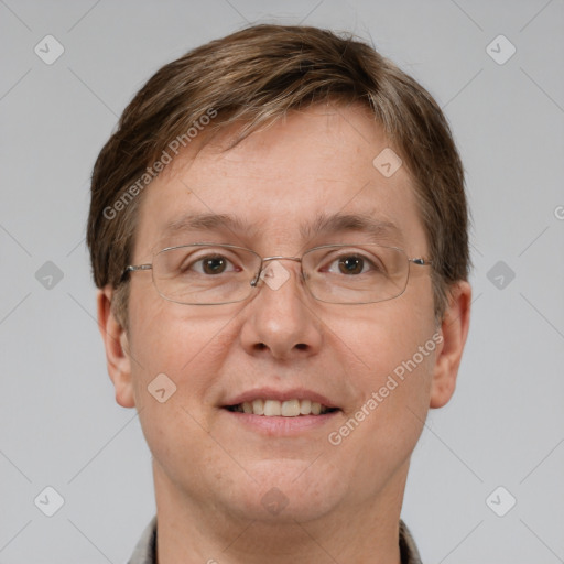 Joyful white adult male with short  brown hair and grey eyes