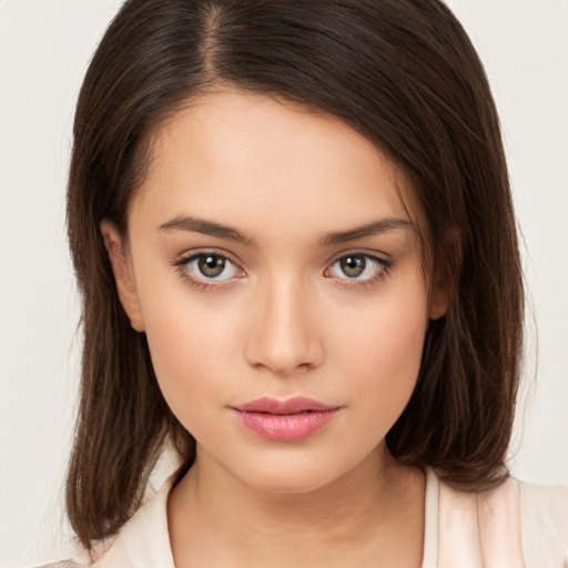 Neutral white young-adult female with medium  brown hair and brown eyes