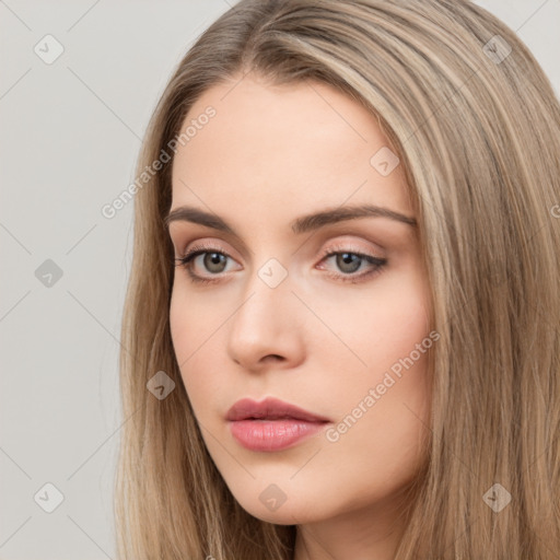 Neutral white young-adult female with long  brown hair and brown eyes