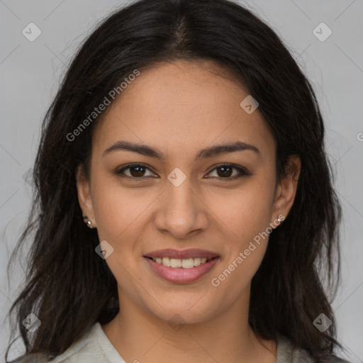 Joyful latino young-adult female with long  brown hair and brown eyes