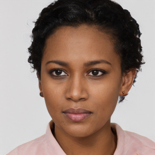 Neutral black young-adult female with short  black hair and brown eyes