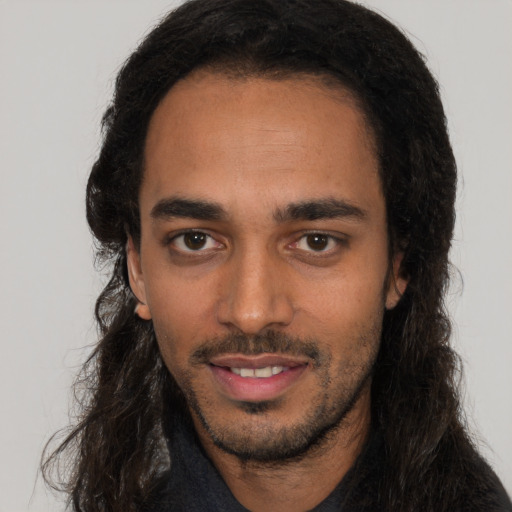 Neutral white young-adult male with long  black hair and brown eyes