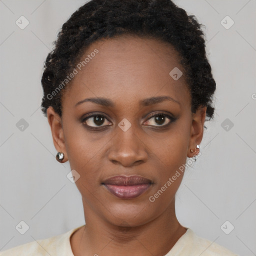 Joyful black young-adult female with short  black hair and brown eyes