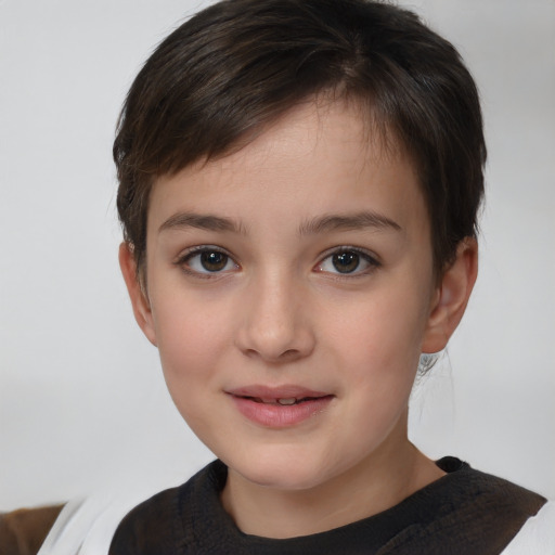 Joyful white child female with short  brown hair and brown eyes