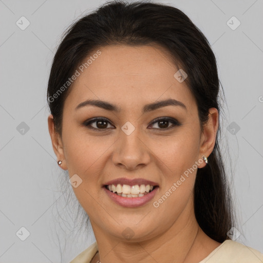 Joyful latino young-adult female with long  brown hair and brown eyes