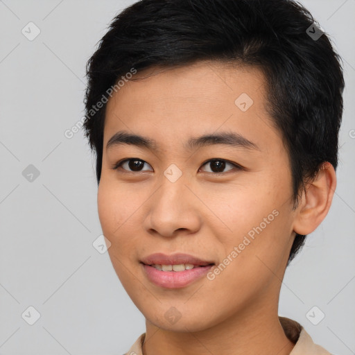 Joyful asian young-adult male with short  brown hair and brown eyes