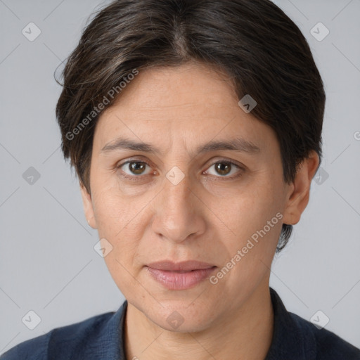 Joyful white adult female with short  brown hair and brown eyes