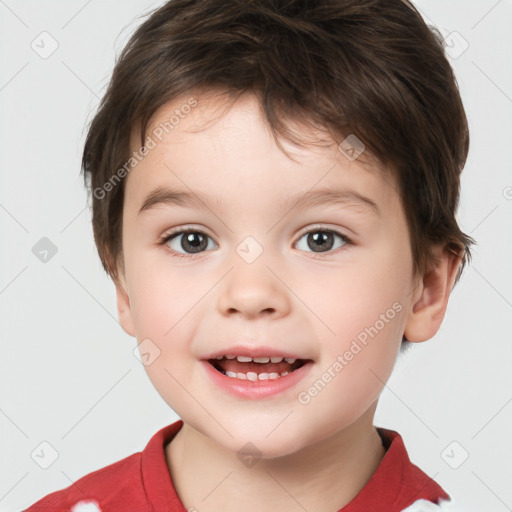 Joyful white child male with short  brown hair and brown eyes