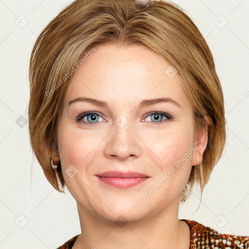 Joyful white young-adult female with medium  brown hair and blue eyes