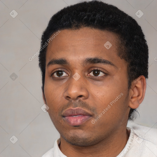 Neutral latino young-adult male with short  black hair and brown eyes