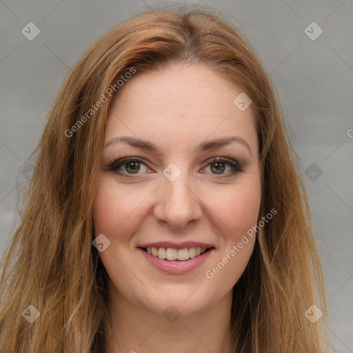 Joyful white young-adult female with long  brown hair and green eyes