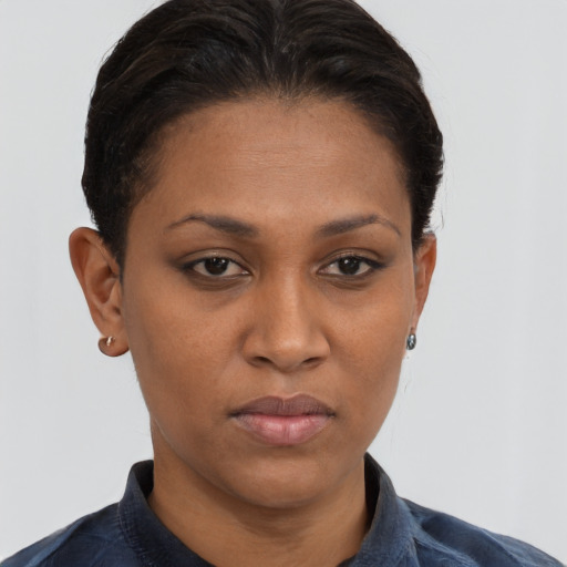 Neutral black young-adult female with short  brown hair and brown eyes