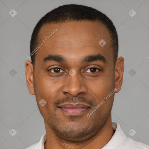 Joyful latino young-adult male with short  brown hair and brown eyes