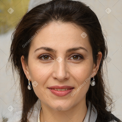 Joyful white adult female with medium  brown hair and brown eyes